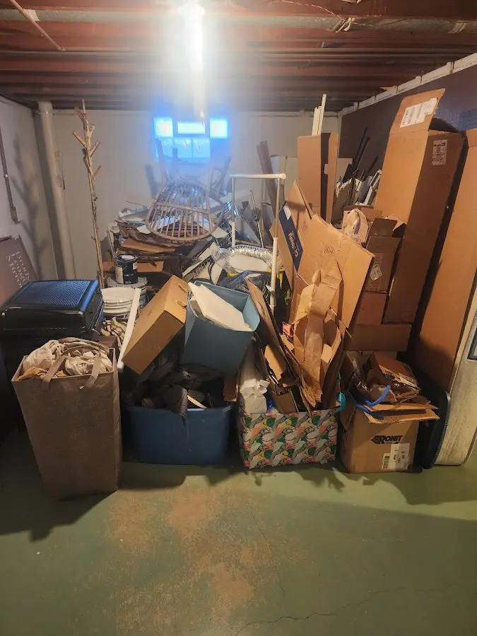 Roll-off dumpster container at job site for Cleanout Dumpster Rental in Hendersonville